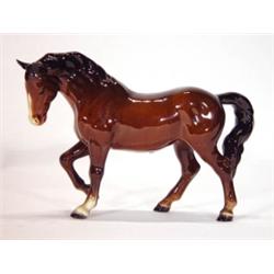 Hand painted brown Beswick horse with raise…