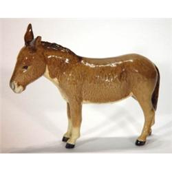 Hand painted Beswick standing donkey, marks…