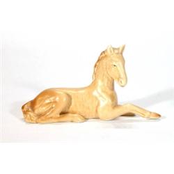 Straw glazed seated Sylvac pony, impressed …