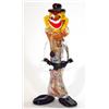 Image 1 : Multi-coloured Murano glass clown clutching…