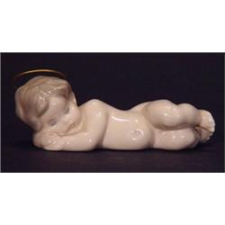 Hand painted Lladro sleeping cherub, marks …