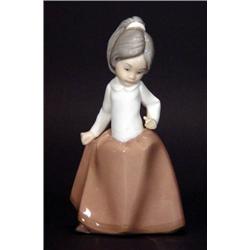 Hand painted Nao child in a brown dress, ma…