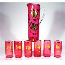 Cranberry coloured glass lemonade jug and s…