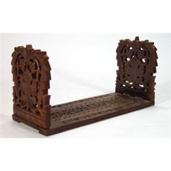 Victorian oak bookslide heavily carved with…