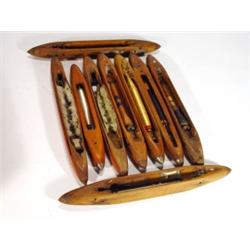 Selection of mahogany and brass loom shuttl…