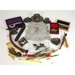 Box of assorted items including carved bone…