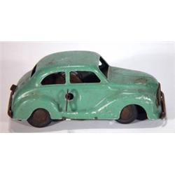 Green painted tinplate clockwork car with r…