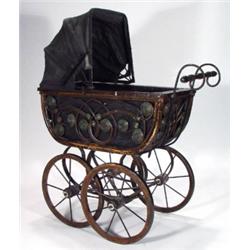 Victorian child's dolls pram on an iron and…