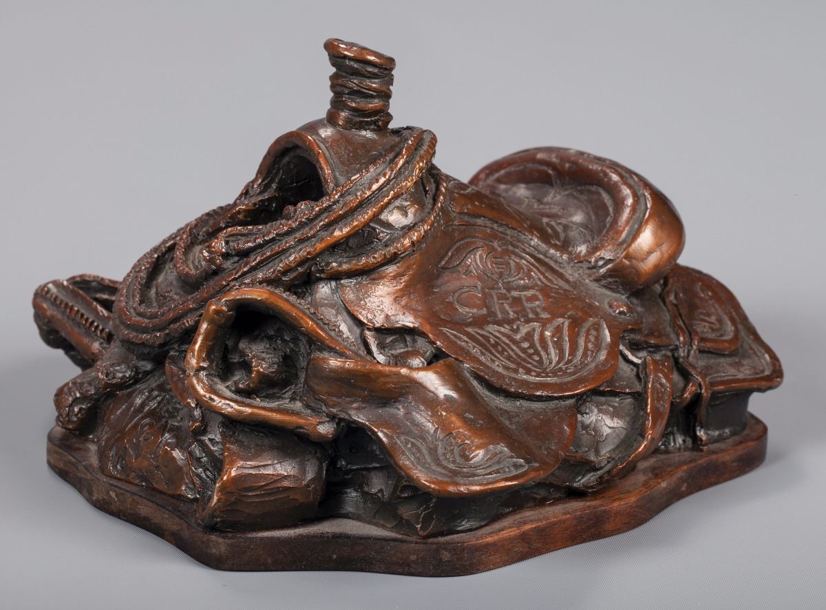Two Charlie Russell Riders Bronzes by Michael Coleman and Herb Mignery