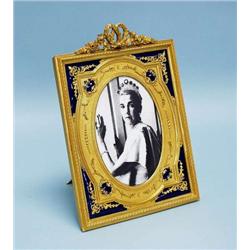 A good French gilt bronze and enamel easel pi...