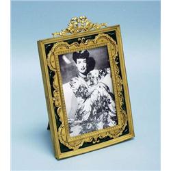 An antique French gilt bronze and enamel ease...