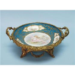 An antique French Sevres porcelain centrepiec...