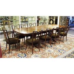 A good English mahogany and fruitwood dining...