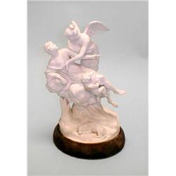 An antique French bisque porcelain group of t...