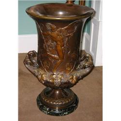 An antique French brown patinated bronze jard...