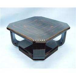 An unusual French macassar ebony coffee table...