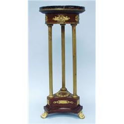 An antique French Empire style bronze mounted...