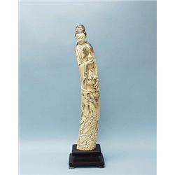 A large Chinese ivory figure of a Quan-Yin in...