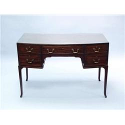 An English mahogany lady's desk by Maple Co....