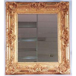 A well carved antique French gilt wood salon...