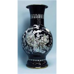 A pair of Chinese black paper-mache floor vas...