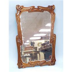 ART NOUVEAU - A finely carved mahogany framed...