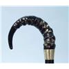Image 1 : An English ebonized wood walking stick with c...
