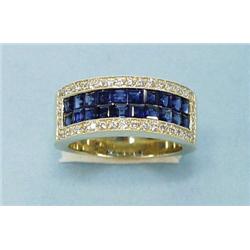 An 18 kt. yellow gold, diamond and sapphire b...