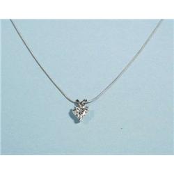 A white gold bezel set heart shaped diamond p...