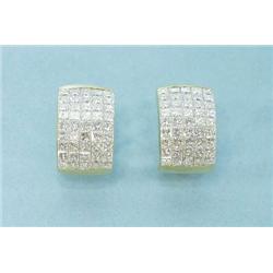 A pair of 18 kt. yellow gold and diamond earr...