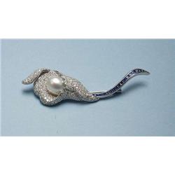 An 18 kt. white gold, sapphire and diamond br...