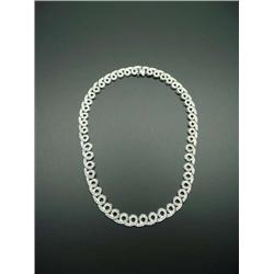 An 18 kt. white gold and diamond necklace. Un...