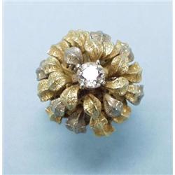 A 14 Kt. yellow gold lady's flower design rin...