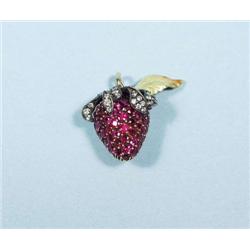 An 18 kt. yellow gold, ruby and diamond penda...
