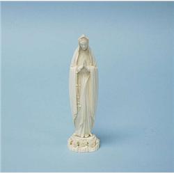 A good miniature African ivory carving of a r...