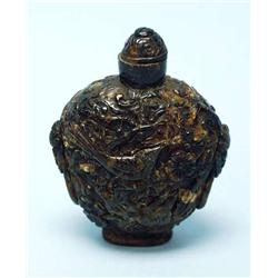 A good Chinese amber snuff bottle. The flask...