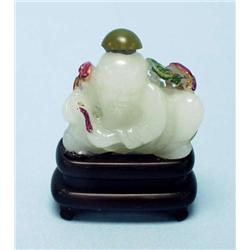 An unusual Chinese jade snuff bottle, carved...