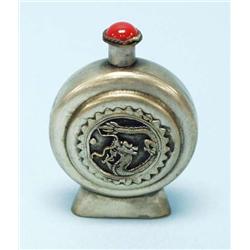 An unusual Mongolian silver snuff bottle. The...