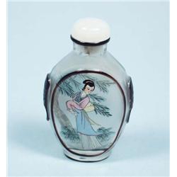 An inside painted overlay glass snuff bottle....
