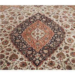 A semi-antique Persian Qum silk carpet. Signe...