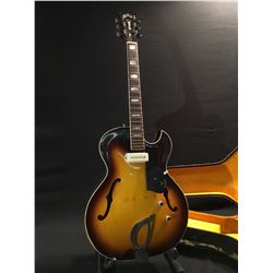 GUILD STARFIRE CE-100 HOLLOW BODY ELECTRIC GUITAR, SERIAL NUMBER 19476, COMES WITH HARD SHELL CASE,