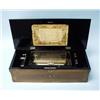 Image 1 : An antique Swiss music box. Rectangular case...