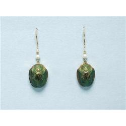 A pair of 18 kt. gold earrings, each green en...
