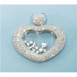 A Choppard design 18 kt. white gold "Happy Di...