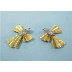 A pair of 18 kt. yellow gold and diamond clip...