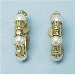 BULGARI - A pair of 18 kt. gold hoop earrings...
