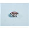 Image 1 : A platinum, ruby and diamond cluster ring. Th...