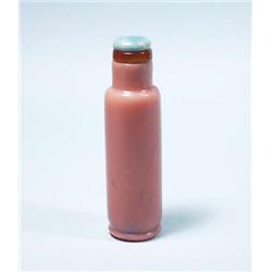 A Chinese pink overlay glass snuff bottle wit...