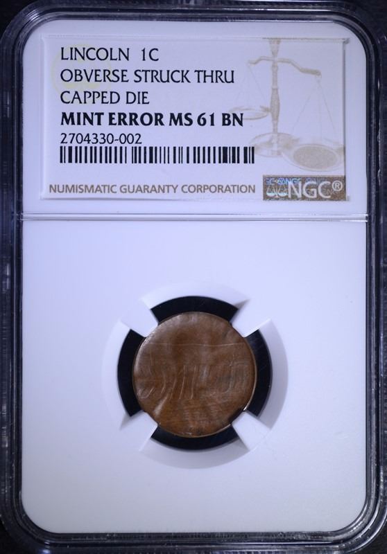 LINCOLN CENT MINT ERROR ( OBVERSE STRUCK THRU, CAPPED DIE ) NGC MS-61 BN