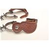 Image 4 : Pair of un-marked inlaid spurs with tooled  leather straps; nicely accomplished.      Est.:  $150-$3